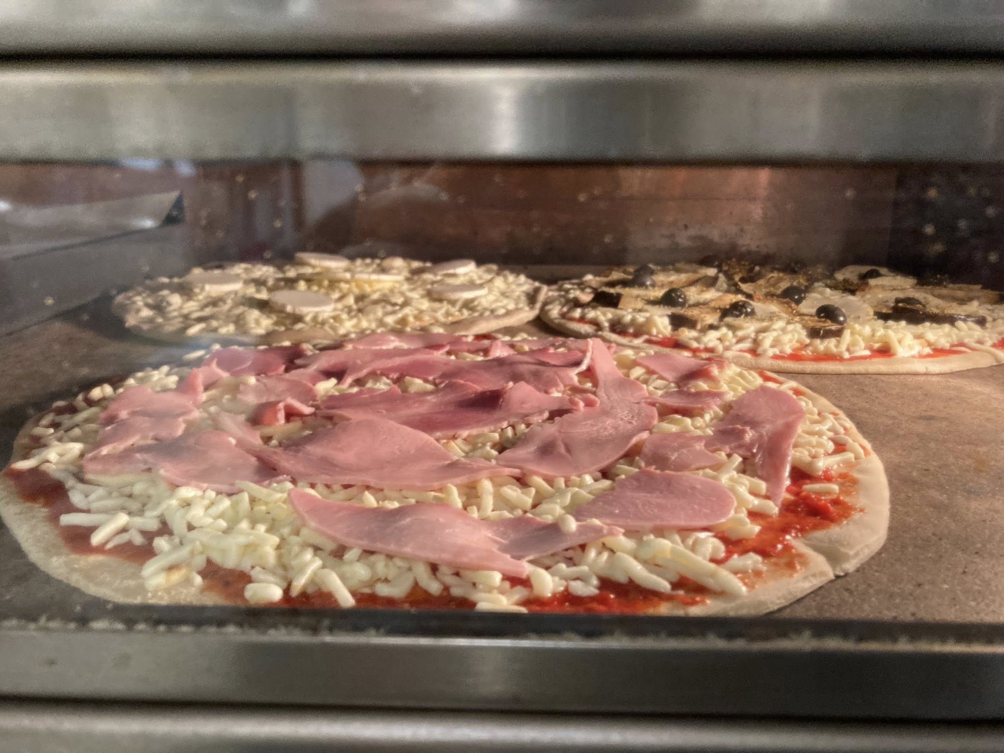 Pizza dans le four